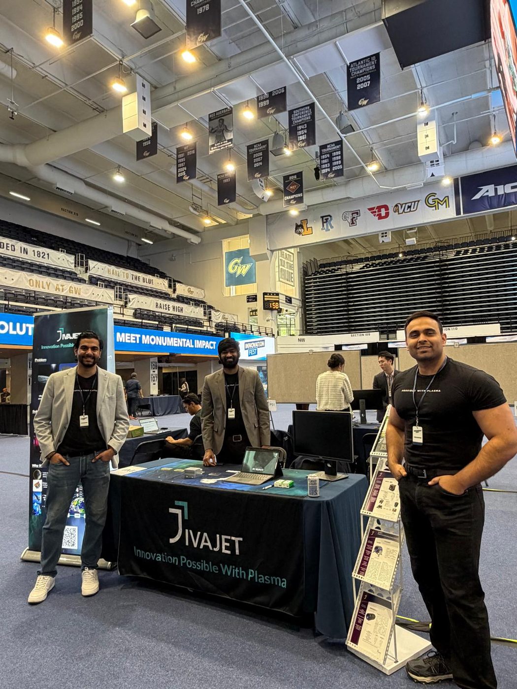 JivaJet booth at GWU Innovation Fest 2026 with Vikas, Guru, and Anmol